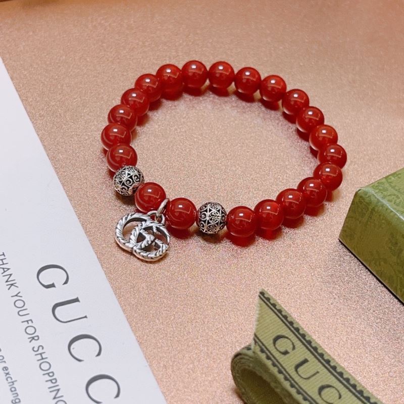 G*u*i bracelets
